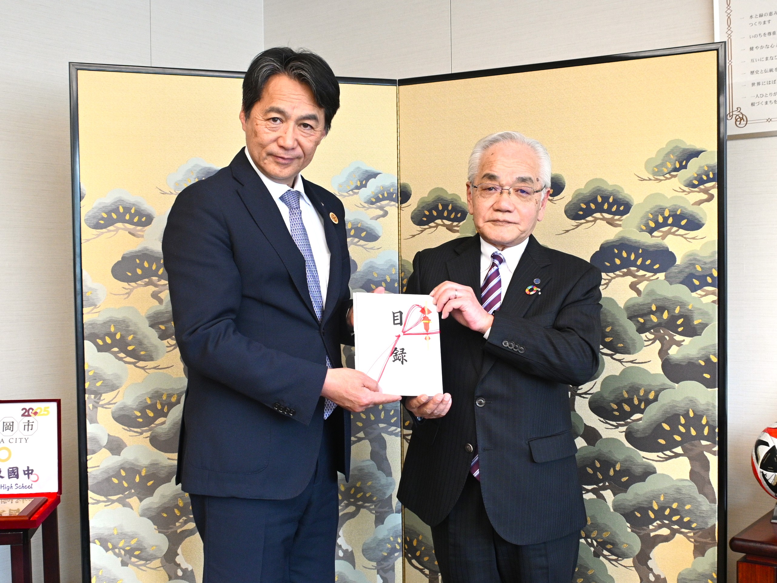 寄附贈呈式_日本メンテナスエンジニヤリング株式会社